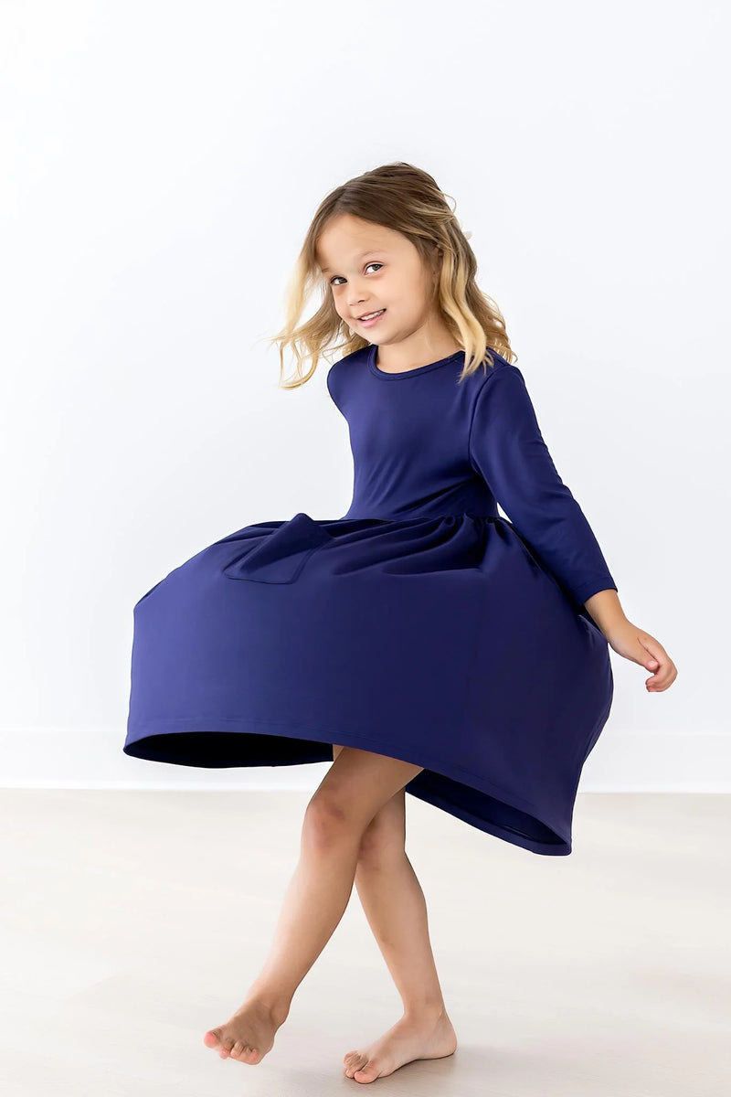 NAVY 3/4 POCKET TWIRL DRESS