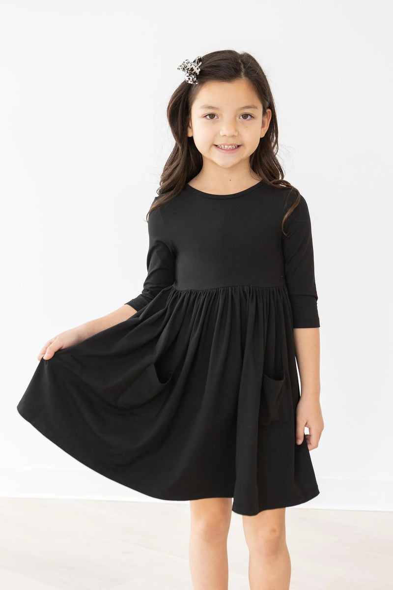 BLACK POCKET TWIRL DRESS